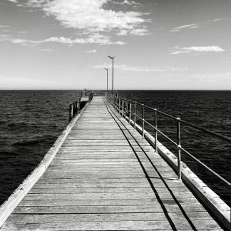 Into the horizon black and white coastal landscape photography print by Mark Hulskamp