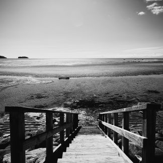 Low tide black and white coastal landscape photography print by Mark Hulskamp